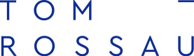 Tom Rossau logo in blue text.